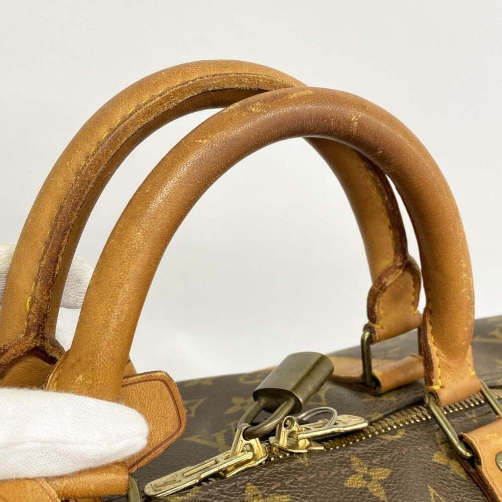 LOUIS VUITTON Brown Monogram Keepall 60 Boston Bag - Picture 7 of 11